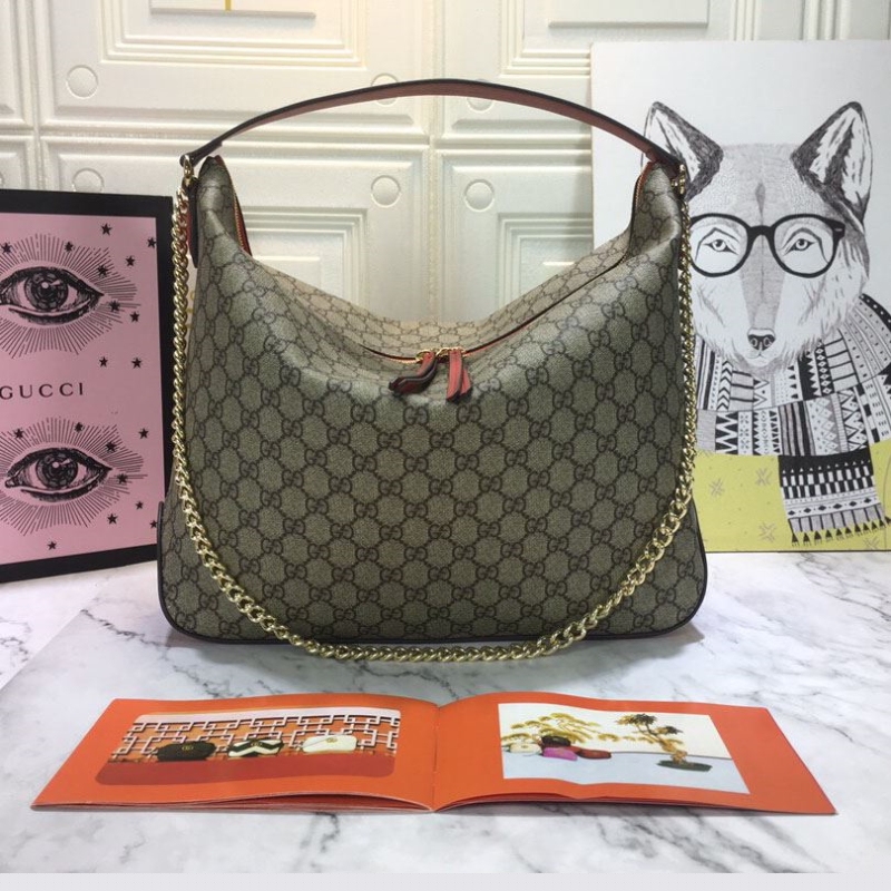G*u*i top handle bags
